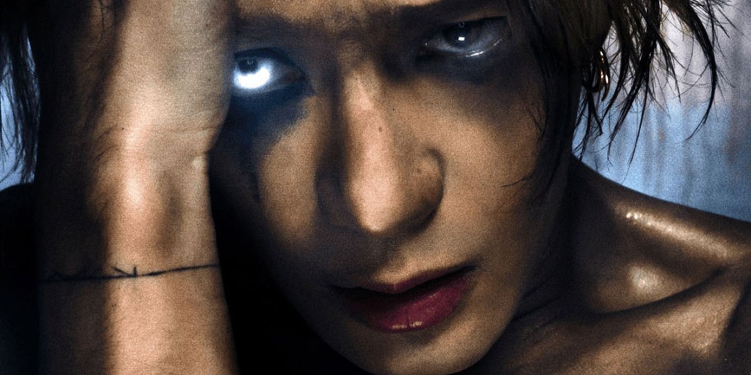 Jackson Wang in his Magic man persona with his weird eyes and scrawny self.