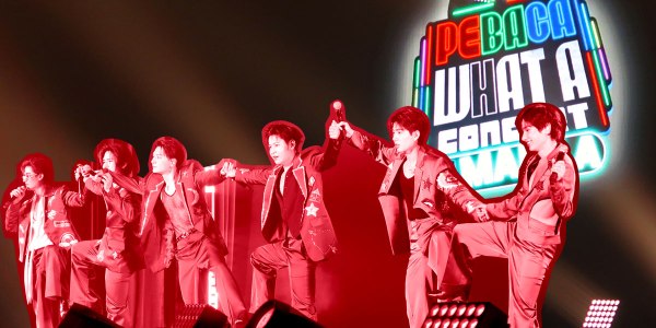 TayNew, OffGun, and KristSingto being funny on stage. A colorful sign of the PEBACA What a Concert show on the back.